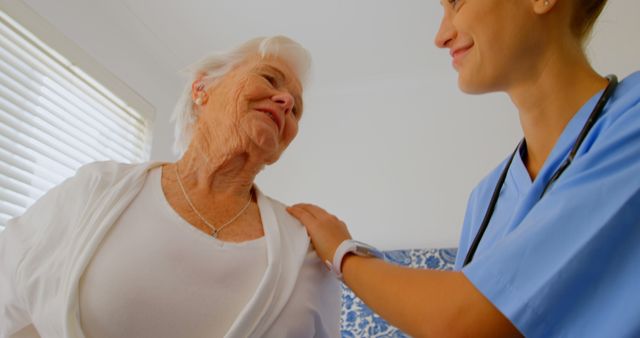 Smiling Nurse Assisting Senior Woman at Home - Download Free Stock Images Pikwizard.com