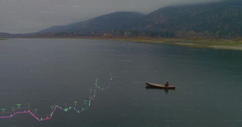 Canoeist paddling on misty lake with rising financial chart overlay for business concept