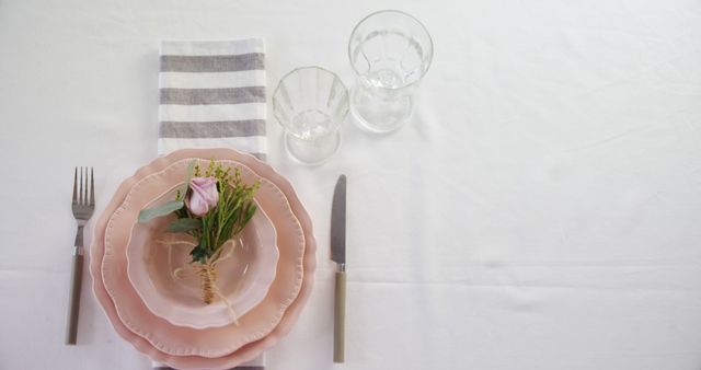Elegant Table Setting with Floral Decor and Ceramic Plates - Download Free Stock Images Pikwizard.com