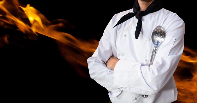 Chef standing confidently with arms crossed, holding a skimmer, with dramatic flames in the background. Ideal for use in culinary blogs, restaurant promotions, cooking classes, and food-related advertisements to convey expertise and passion for cooking.