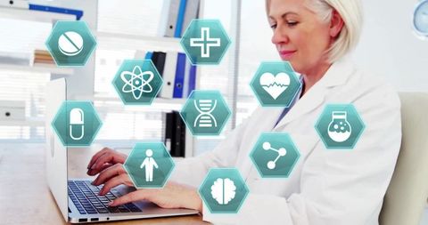 Medical Professional Typing on Laptop with Technology Icons Overlay
