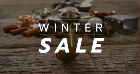 Winter Sale Advertisement on Wooden Background with Decorations