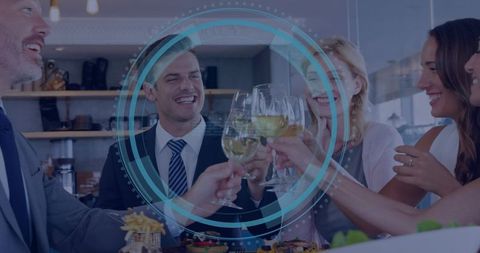 Executives toasting with wine celebrating networking success at upscale restaurant bar