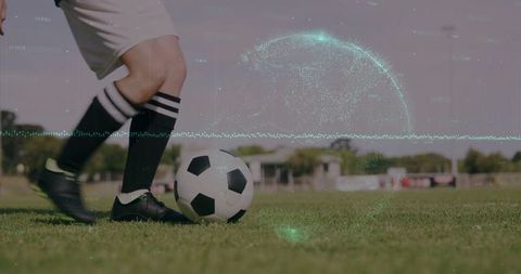 Female Athlete Dribbling Soccer Ball with Digital Overlay on Field