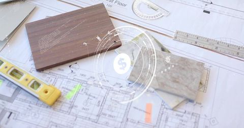 Architectural blueprints with material samples on design desk
