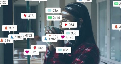 Woman Drinking Coffee Overwhelmed by Social Media Notifications
