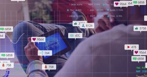 Relaxed man checking social media analytics on tablet