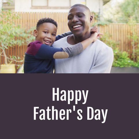 Cheerful Father and Son Celebrating Father's Day in Garden
