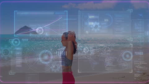 Asian Woman Exercising on Beach with Futuristic Data Overlay