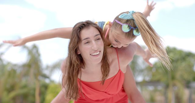 Mother and Daughter Enjoying Fun Time Outdoors - Download Free Stock Images Pikwizard.com