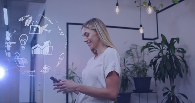 Smiling businesswoman using smartphone while interacting with holographic display in modern office. Ideal for concepts related to innovation, digital transformation, technology in business, future workplace, and professional environments.