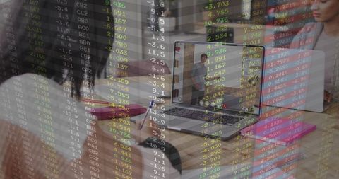 Team discussing remote speaker on laptop with market ticker overlay for hybrid meeting