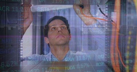 IT Technician Analyzing Data Server Integration Symbolizing Financial Analytics - Download Free Stock Images Pikwizard.com
