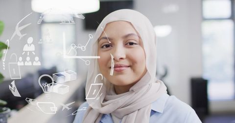 Confident Businesswoman in Hijab Networking with Global Icons