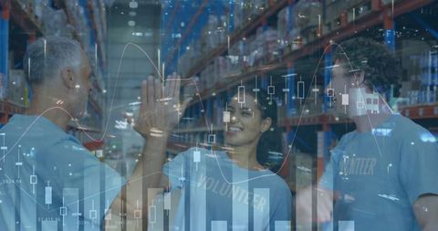 Teamwork in Warehouse Amidst Financial Data Graphics