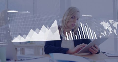 Businesswoman Analyzing Financial Data on Tablet in Corporate Office - Download Free Stock Images Pikwizard.com