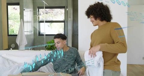 Friends unpacking package with augmented reality overlays in modern living room