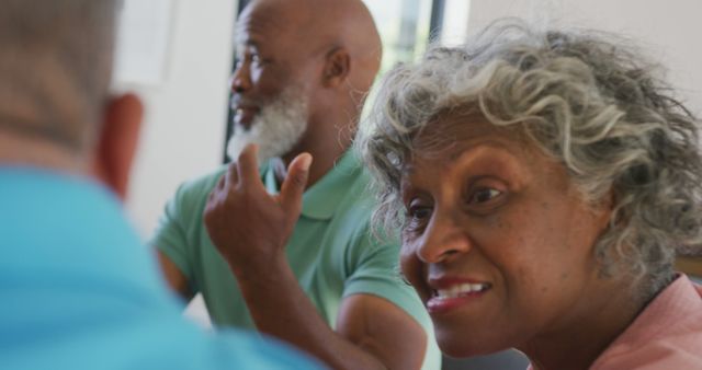 Elderly friends spending quality time engaged in conversation. Ideal for showcasing senior interactions, health and wellness for older adults, lifestyle imagery, geriatric care, and community interactions.