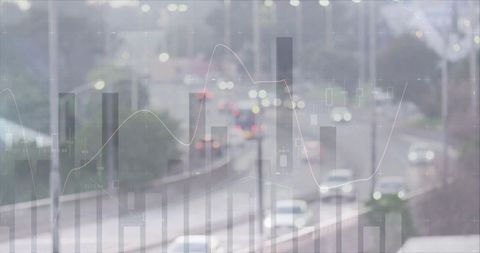 Urban traffic data overlay showing blurred highway with financial charts and bokeh lights
