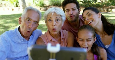 Family Fun with Multi-Generational Selfie Outdoors