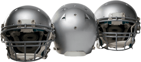 Transparent silver sports helmets arranged side by side