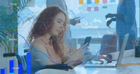 Businesswoman in Wheelchair Analyzing Data