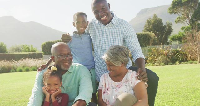 Smiling Multigenerational African American Family in Park with Mountains in Background - Download Free Stock Images Pikwizard.com