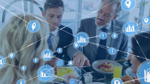 Business Team Strategizing with Digital Network Icon Overlay