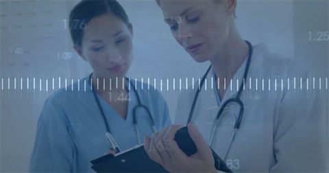 Healthcare Professionals Analyzing Data with Modern Technology Overlay