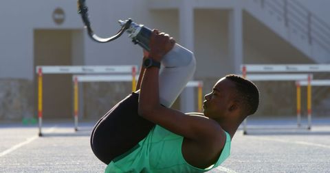 Dedicated Teenage Athlete Training on Outdoor Track