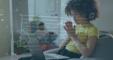 Focus on African American Woman Analyzing Financial Data