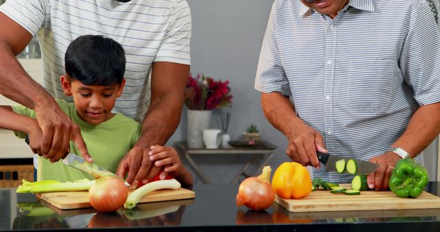 Child Learning Viegetable Preparation with Family in Kitchen - Download Free Stock Images Pikwizard.com