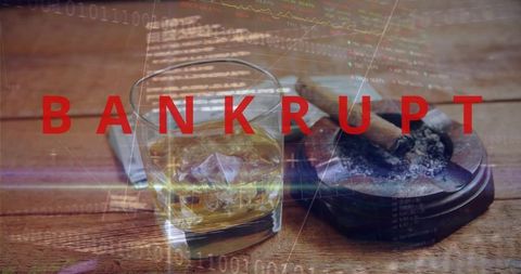 Bankrupt concept showing whiskey tumbler and cigar ashtray over falling stock tickers