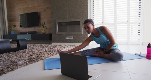Woman Practicing Yoga At Home Using Online Video Tutorial - Download Free Stock Images Pikwizard.com