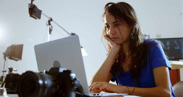 Young Woman Editing Photos on Computer in Photography Studio - Download Free Stock Images Pikwizard.com