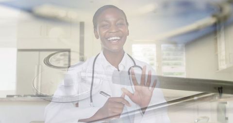 Smiling Female Doctor Discussing Digital Healthcare Solutions