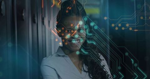 Smiling Female IT Engineer in Modern Data Center