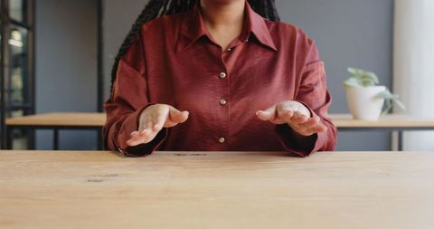 Businesswoman Making Gestures During Meeting in Office Environment - Download Free Stock Images Pikwizard.com