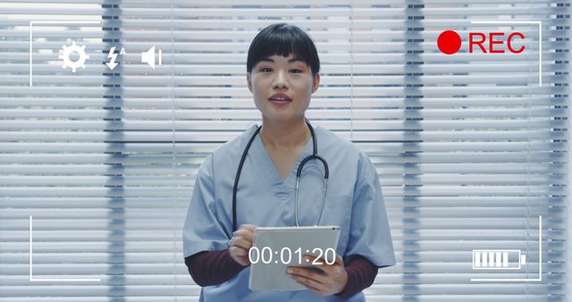 Nurse recording medical video tutorial with tablet and stethoscope - Download Free Stock Images Pikwizard.com