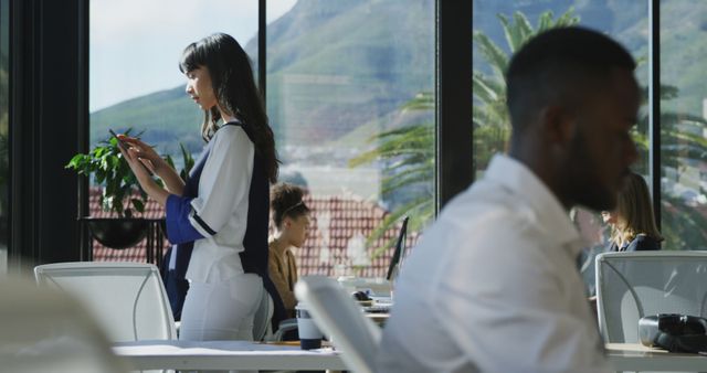 Multicultural Team Works in Modern Open-Plan Office with Mountain View - Download Free Stock Images Pikwizard.com