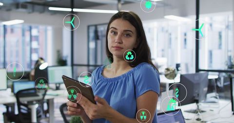 Businesswoman Using Tablet with Technology and Innovation Icons