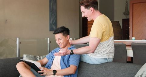 Happy Diverse Male Couple Enjoying Quality Time at Home