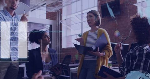 Team Discussing Creative Ideas in Loft Office with Asian Woman Leading
