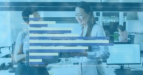 Businesswomen Analyzing Financial Data with Graph Overlays