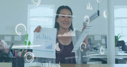 Korean businesswoman presenting data reports with augmented reality analytics overlay