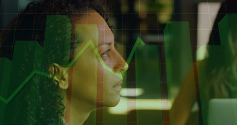 Businesswoman Analyzing Financial Growth Data on Digital Interface