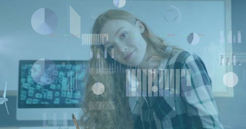 Smiling Businesswoman with Data Infographics in Modern Office