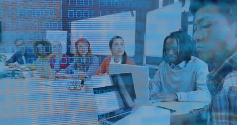 Engaged Team Analyzing Data in Modern Office Environment