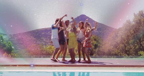 Friends Dancing by Pool with Waterfront and Mountains - Download Free Stock Images Pikwizard.com