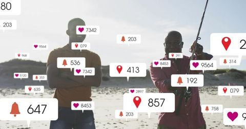Two men standing on beach fishing with social media notifications and location pins